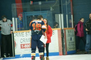 Another Leo Boivin tourney tradition is a post-game 3-Star selection with a twist. Those Boys selected as stars are required to accept their awards from one of the town's fairest maidens. In return, they are expected to plant a quick peck on the cheek of said maiden...to the merriment of the crowd. On occasion, The Row demands the star to "Kiss All Three". Those teams more familiar with the process were noted to send their stars equipped with flowers for the young ladies. All very pomp and circumstance.